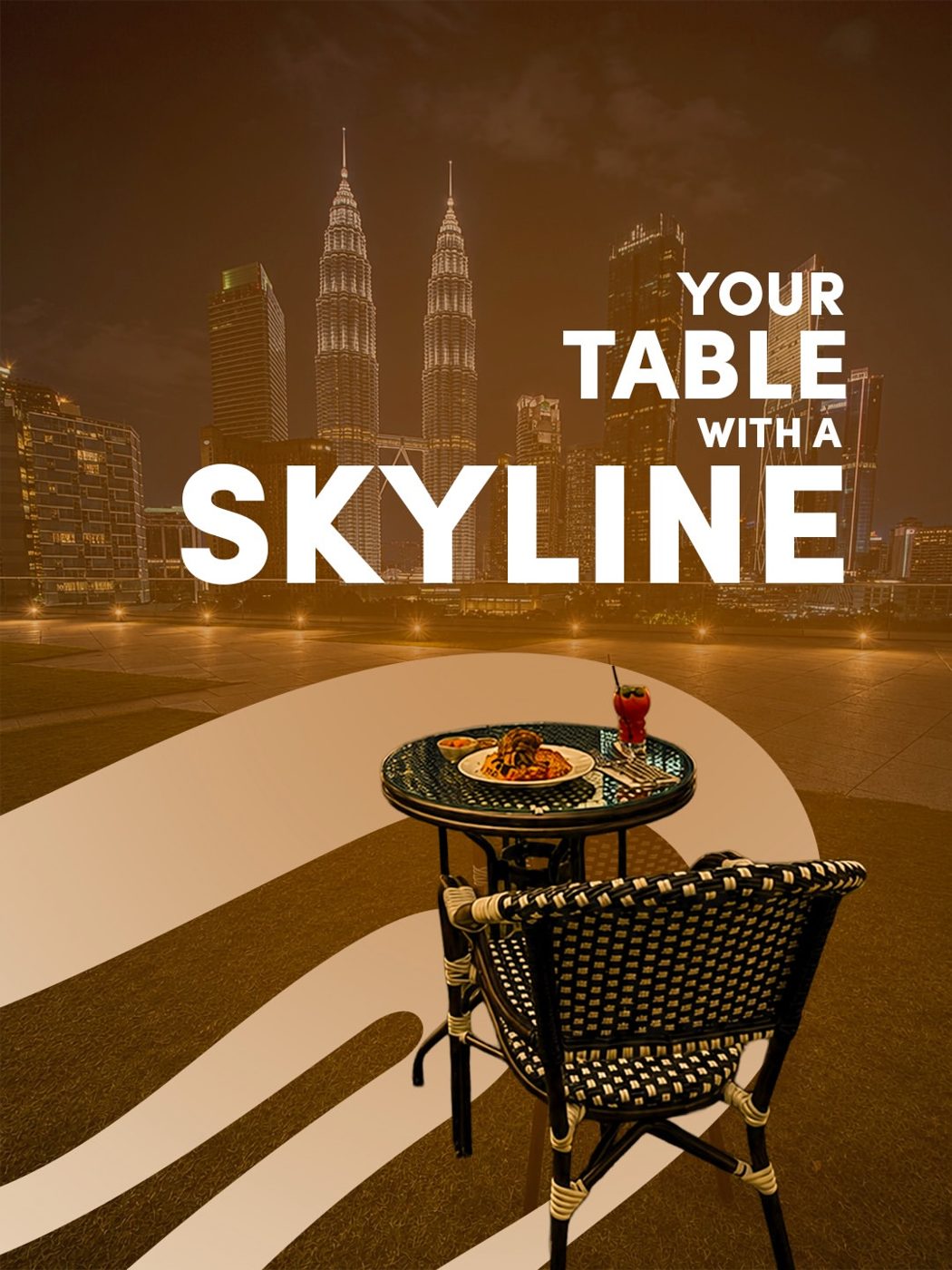 Rooftop terrace table for two at night with the Petronas Towers on the horizon